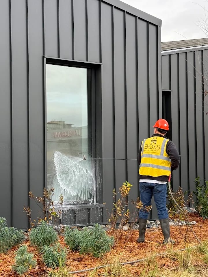 High-pressure facade wash before and after